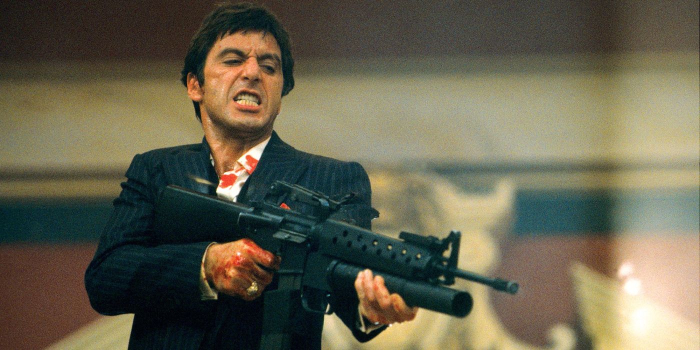 Al Pacino as Tony Montana with a giant machine gun in Scarface