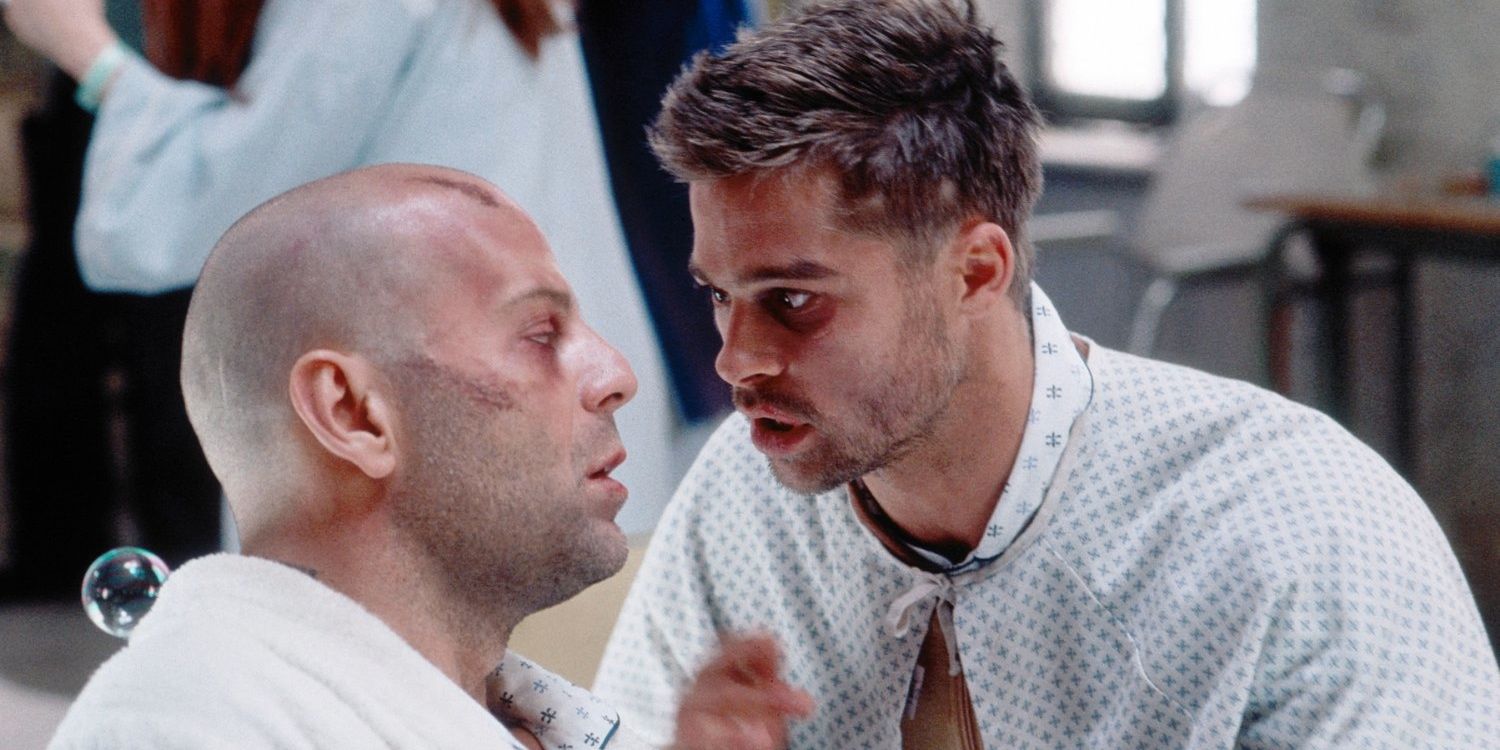 Bruce Willis and Brad Pitt talking in Twelve Monkeys