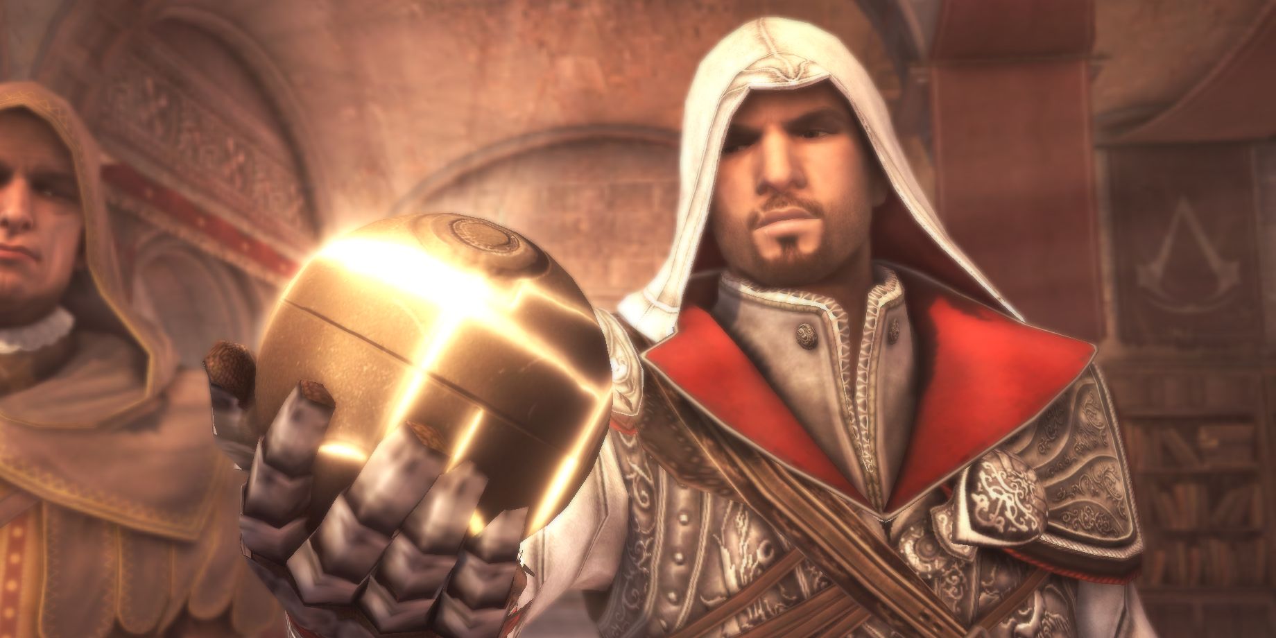 Ezio holds an Apple of Eden in one of the Assassin's Creed games