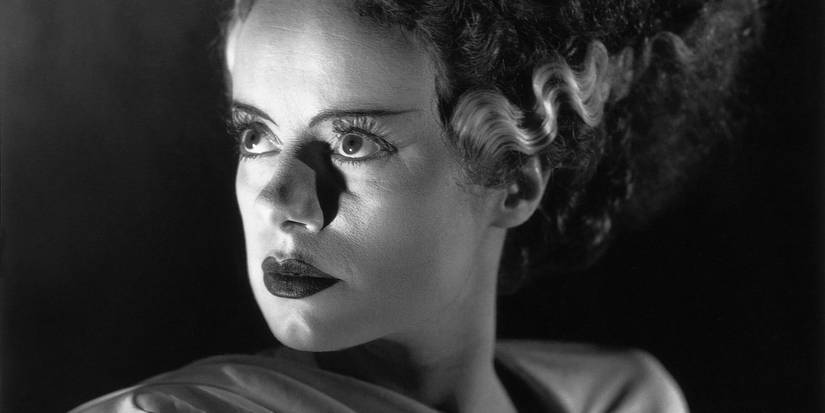 Elsa Lanchester as Bride of Frankenstein staring upward and to the left