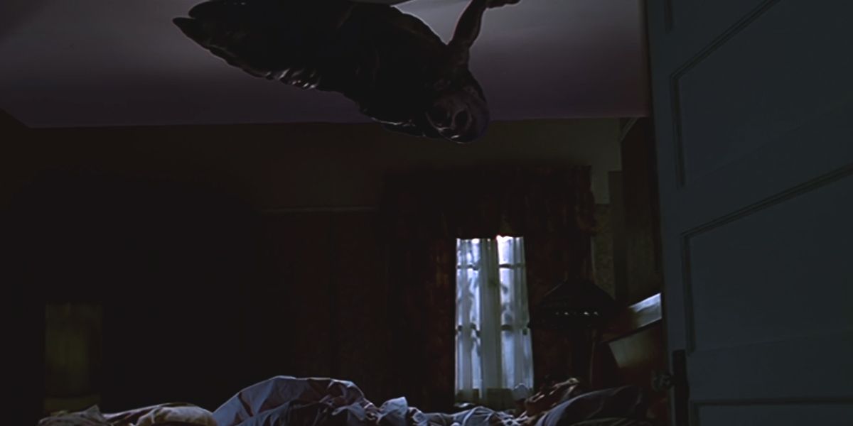 An alien over Joyce's bed in a scene from the Buffy the Vampire Slayer episode Listening to Fear