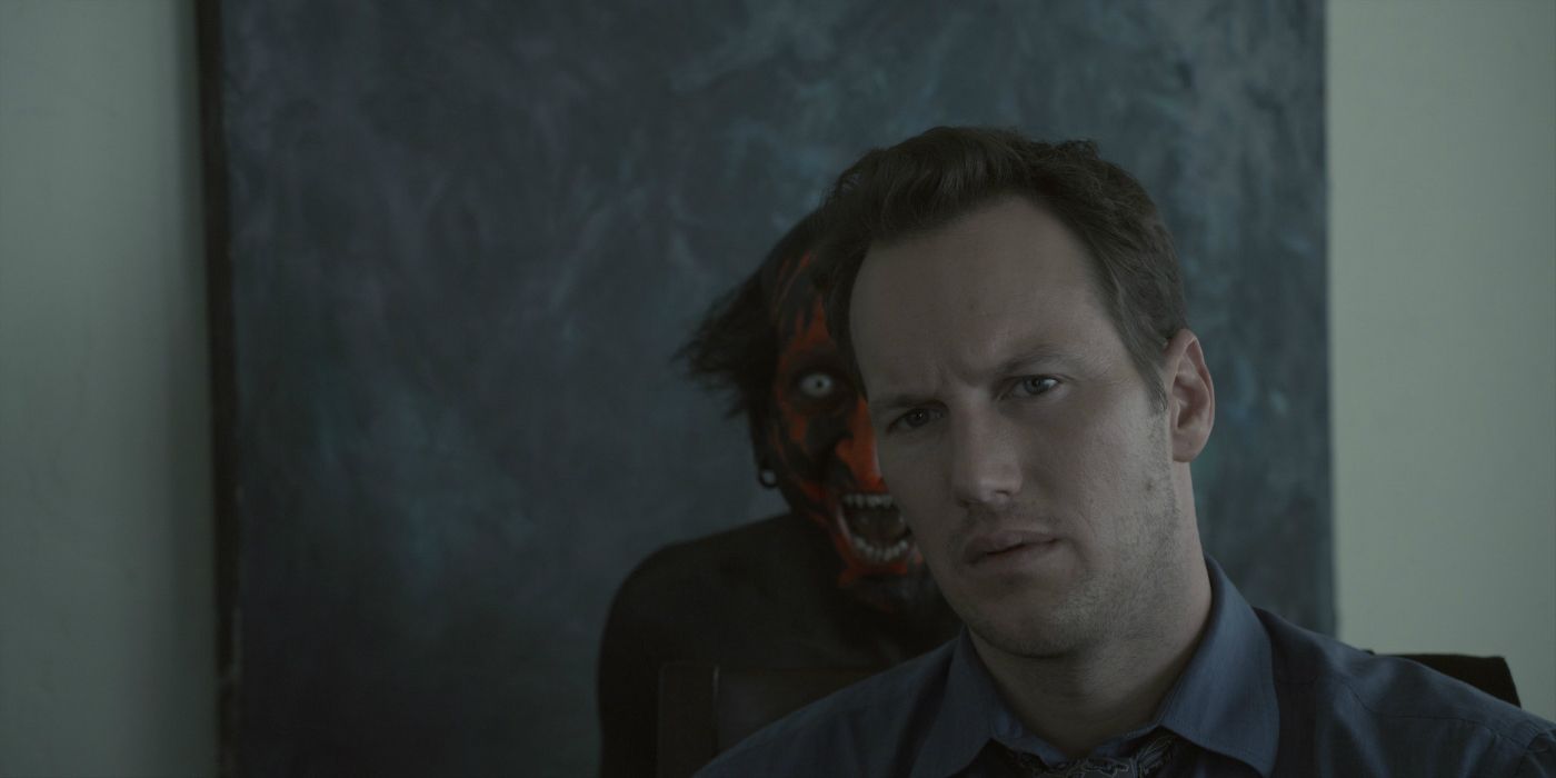 A red demon stands behind Josh (Patrick Wilson) in 'Insidious'