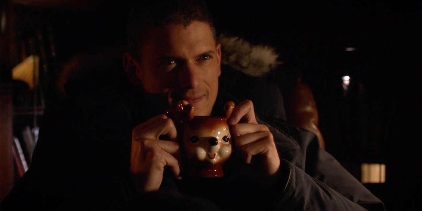 Leonard Snart holding a reindeer cup in The Flash