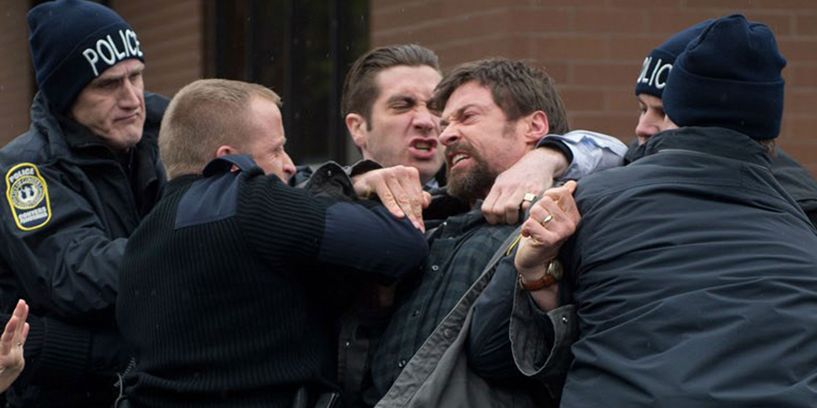 Hugh Jackman fights a group of men in Prisoners.