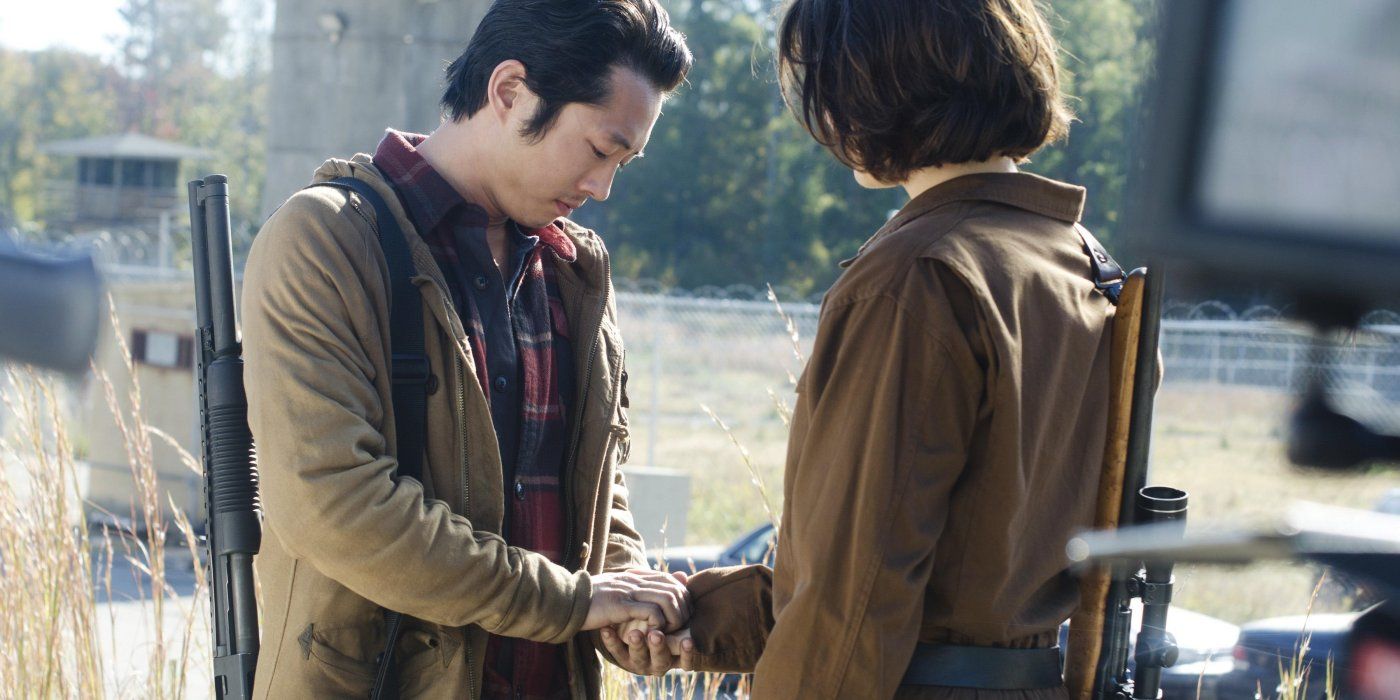 Steven Yeun nel ruolo di Glenn e Lauren Cohan nel ruolo di Maggie in The Walking Dead