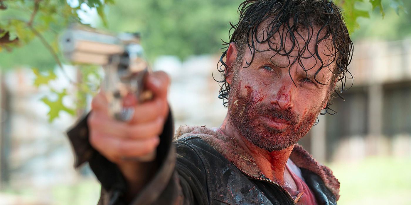 Bloody Rick Grimes holding a gun on The Walking Dead
