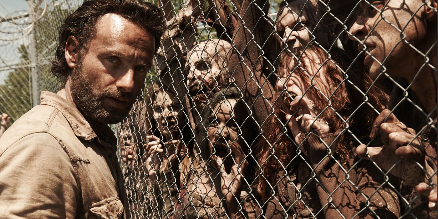 Rick Grimes and fenced Walkers on The Walking Dead