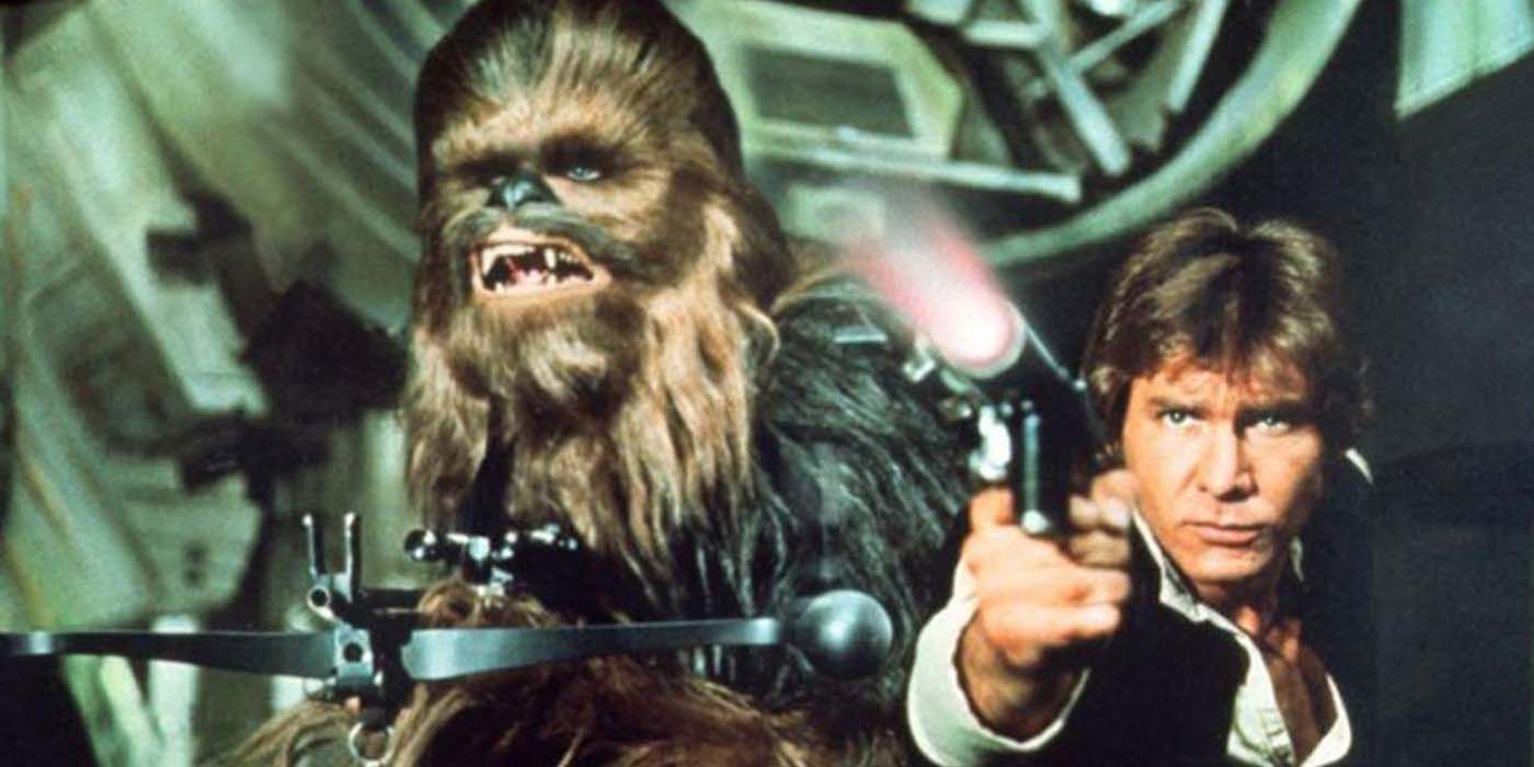 Han Solo and Chewie aiming their weapons in Star Wars.