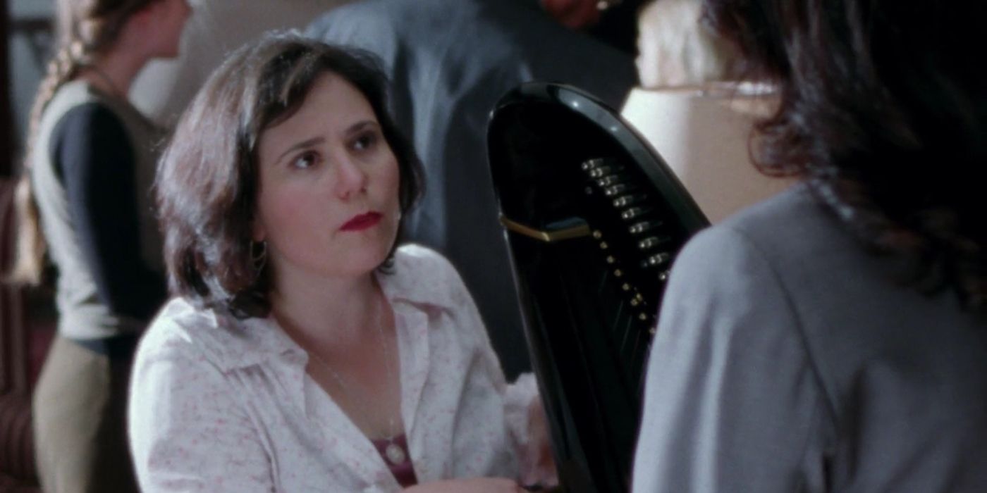 Alex Bornstein com uma harpa em Gilmore Girls.