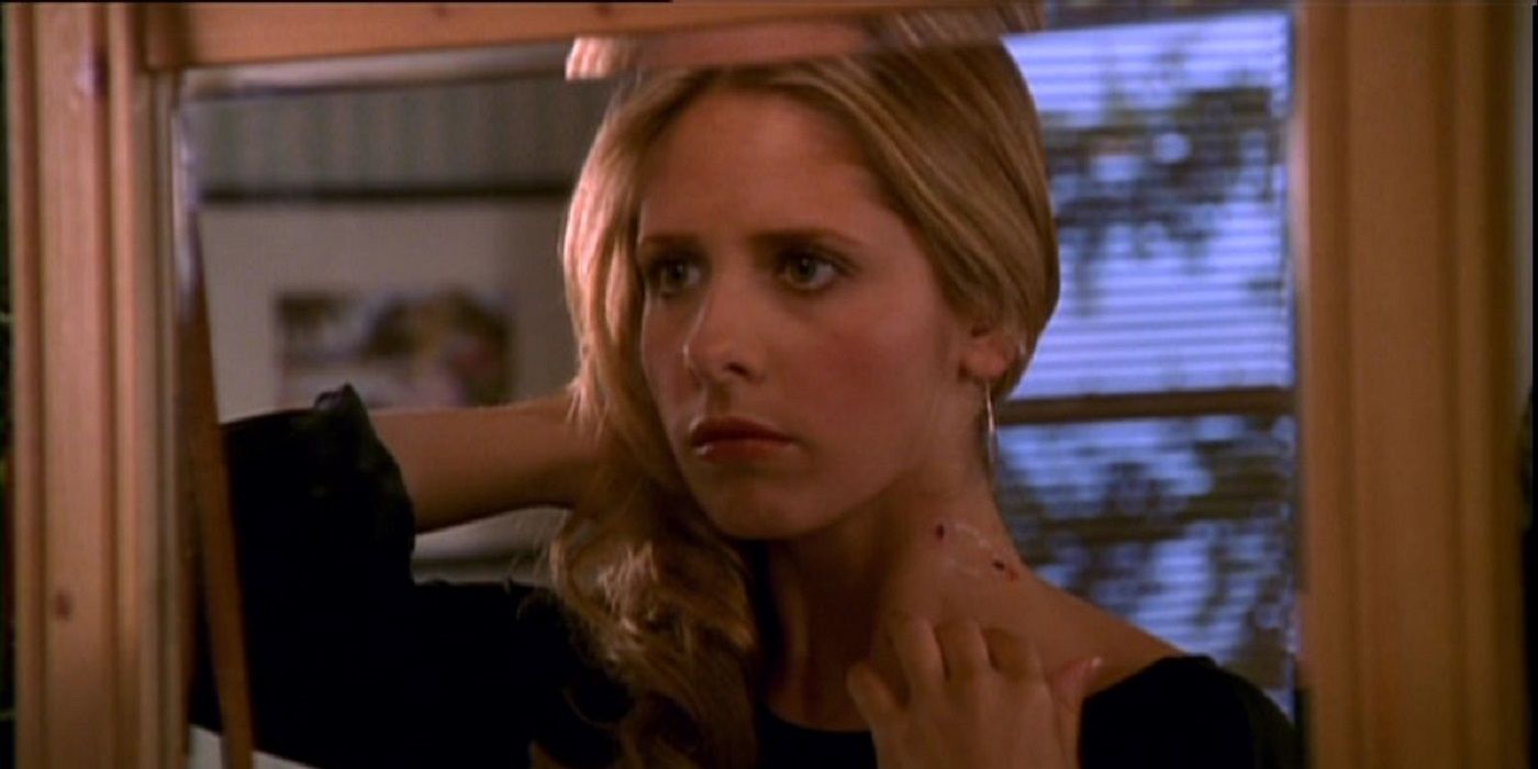 Buffy showing her vampire bite in Buffy the Vampire Slayer