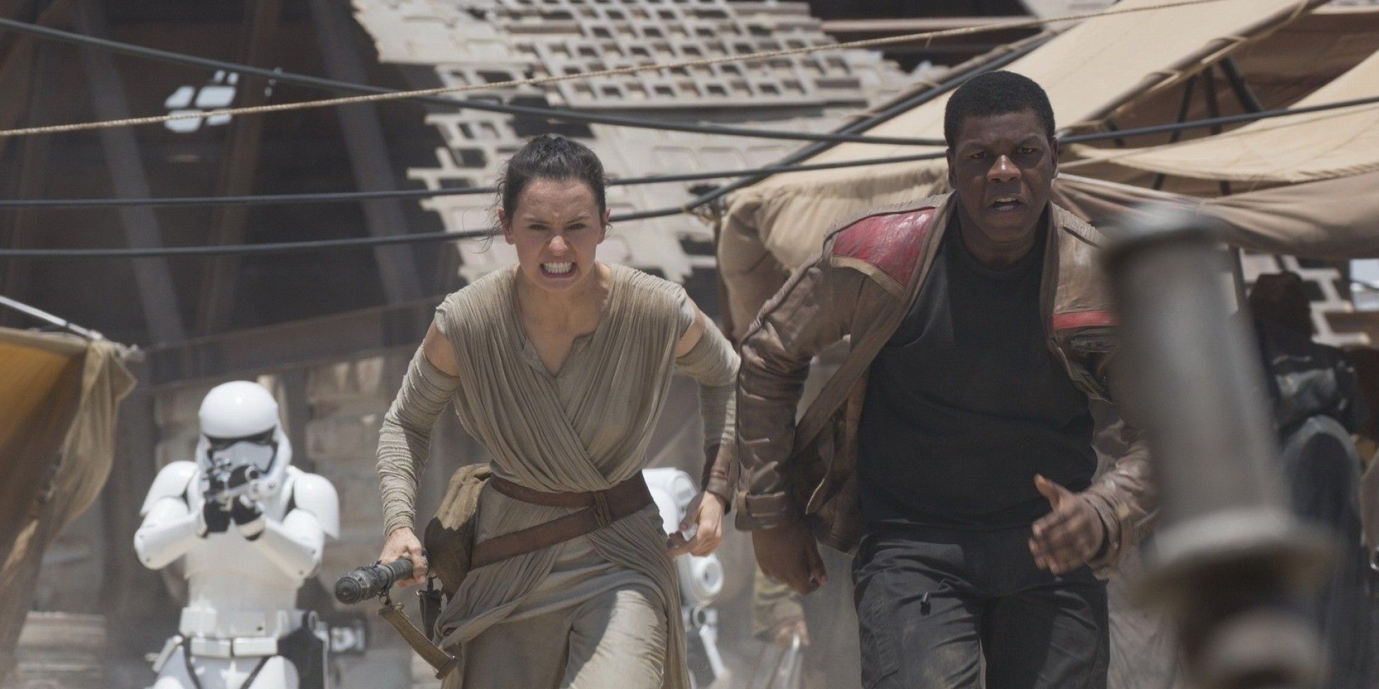 Daisy Ridley as Rey and John Boyega as Finn in Star Wars Episode 7 The Force Awakens