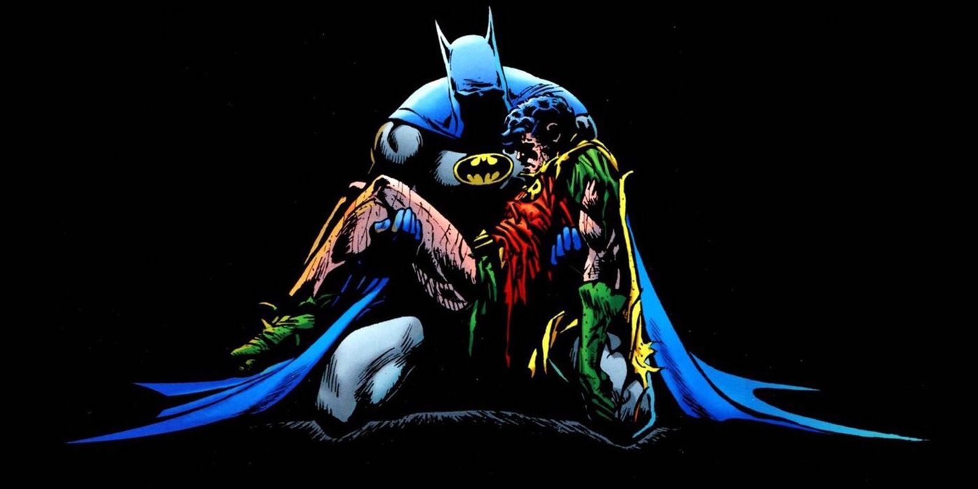 Batman cradles the body of Jason Todd (Robin)