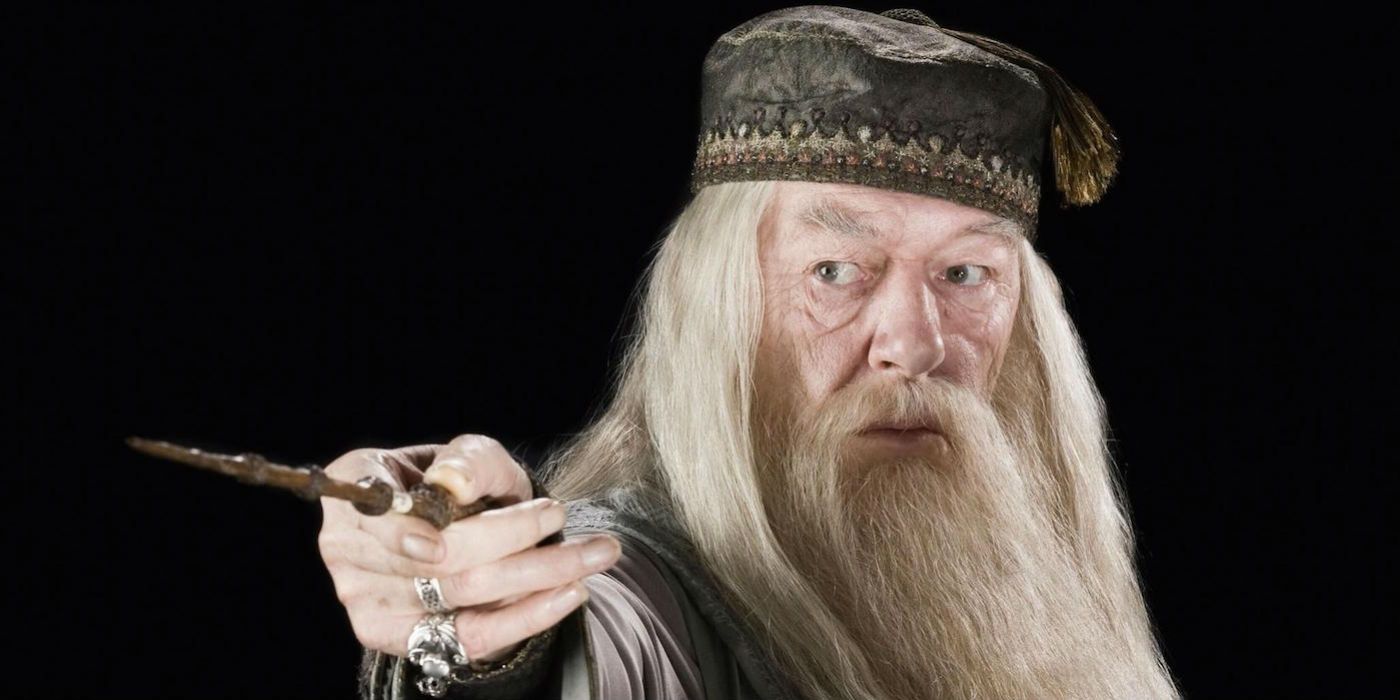 Michael Gambon as Dumbledore pointing his wand in Harry Potter