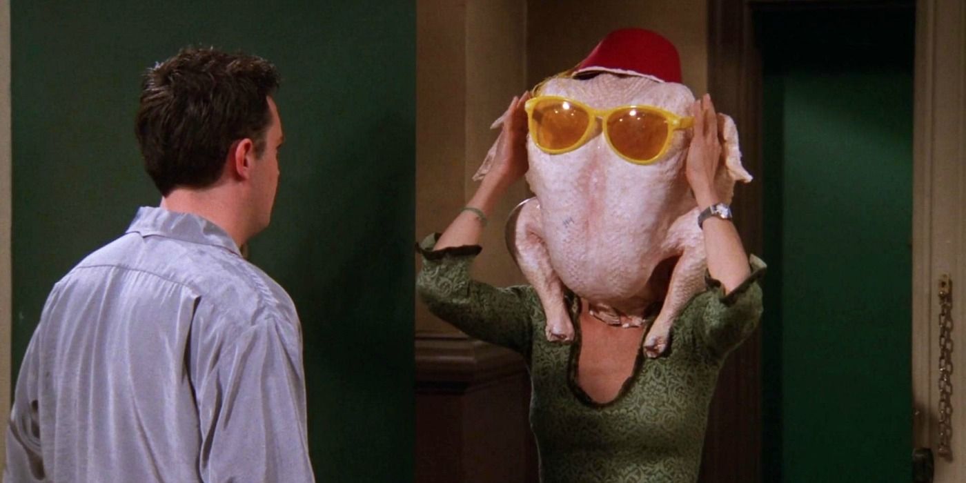 Monica with her head inside a turkey