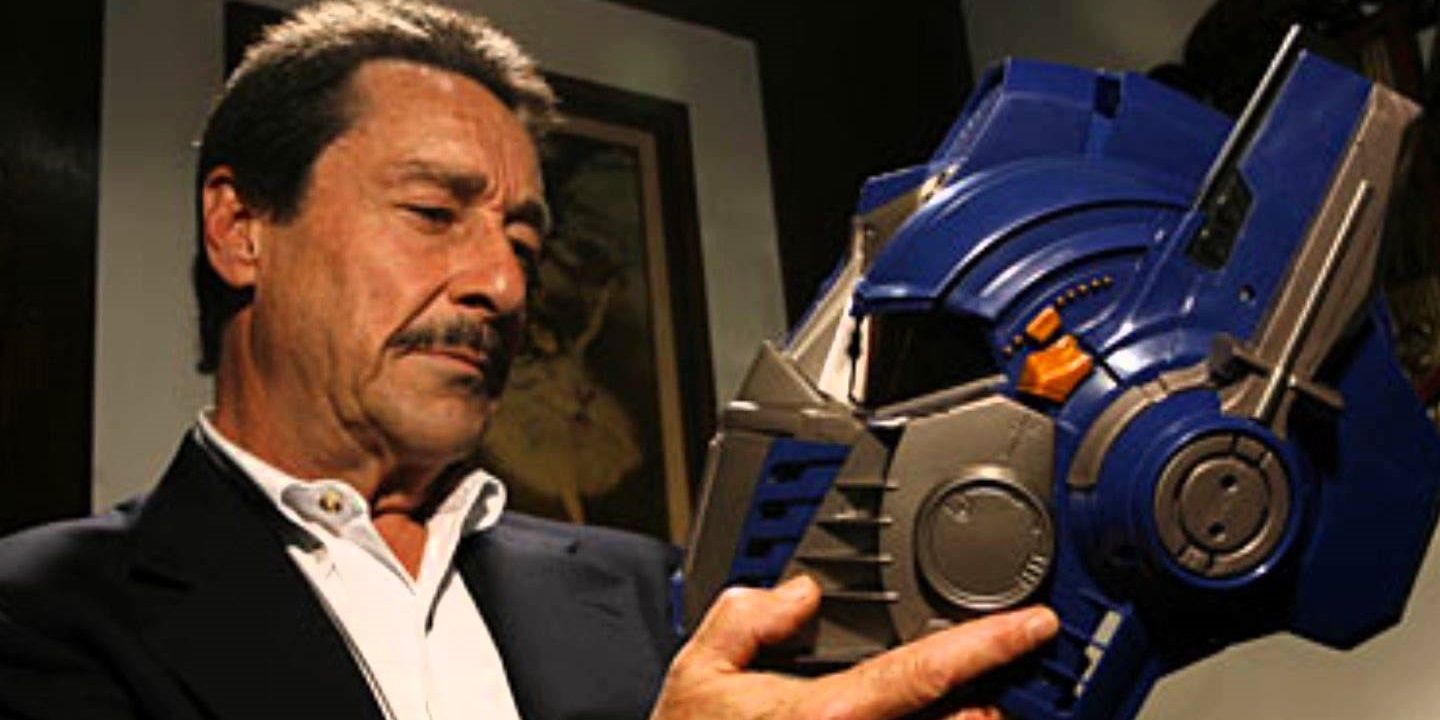 Peter Cullen with an Optimus Prime mask
