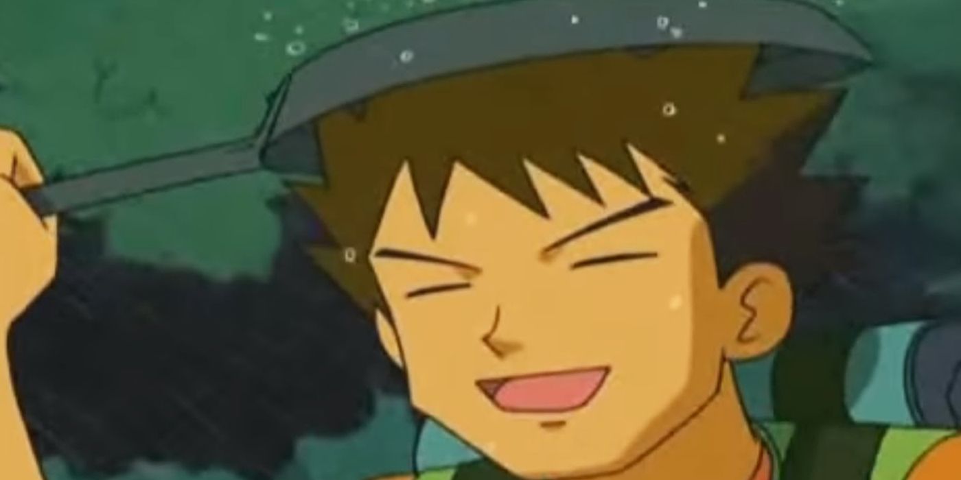 Brock protecting himself from the rain using a frying pan in the Pokémon anime