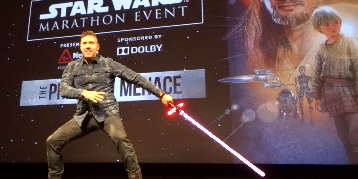 Ray Park with Kylo Ren's lightsaber at a Star Wars event