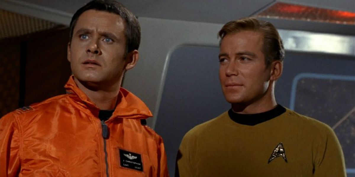 Captain Kirk stands with an astronaut in a scene from Star Trek