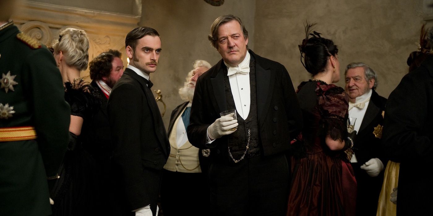 Stephen Fry at a party in Sherlock Game of Shadows