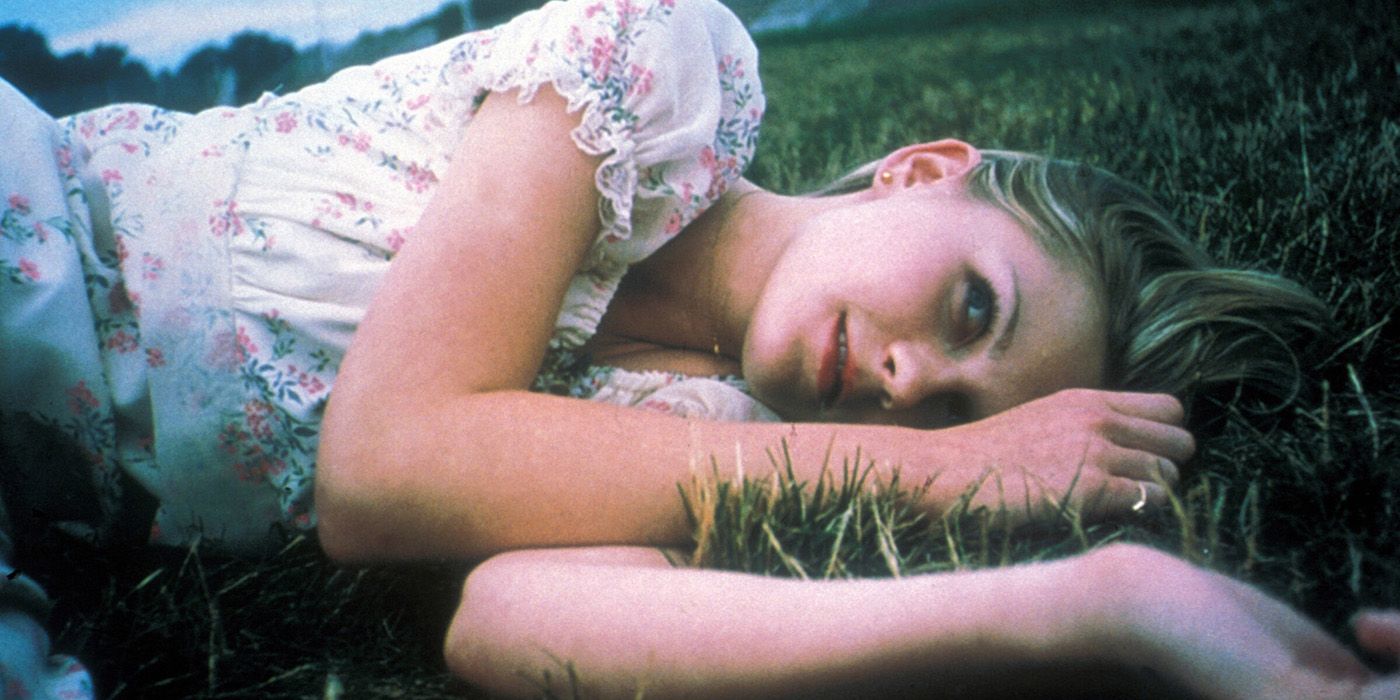 Lux lays on the grass in The Virgin Suicides