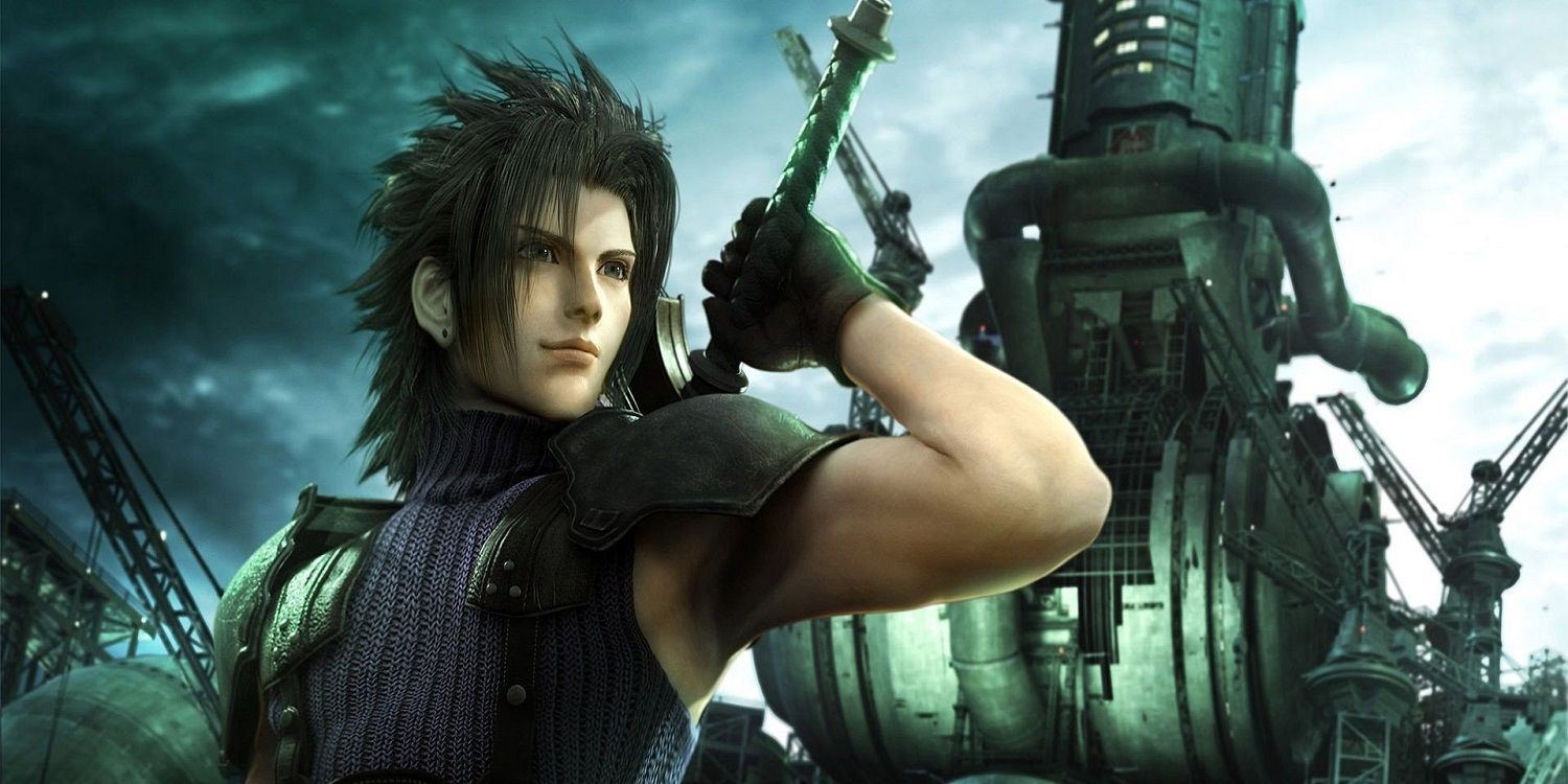 Zack in Final Fantasy VII Crisis Core holding the hilt of a sword on his back.