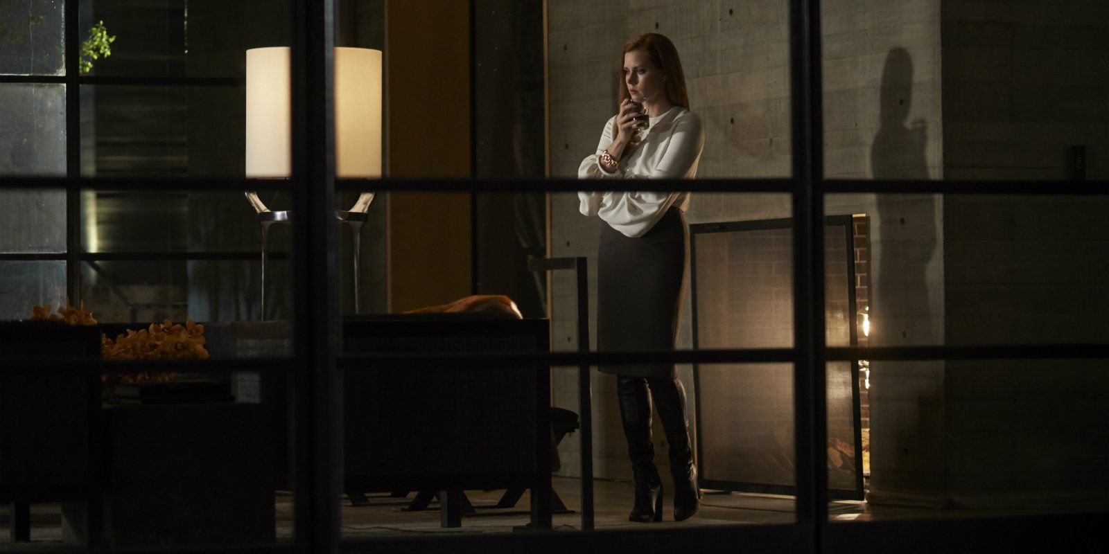 Amy Adams at a balcony in Nocturnal Animals.