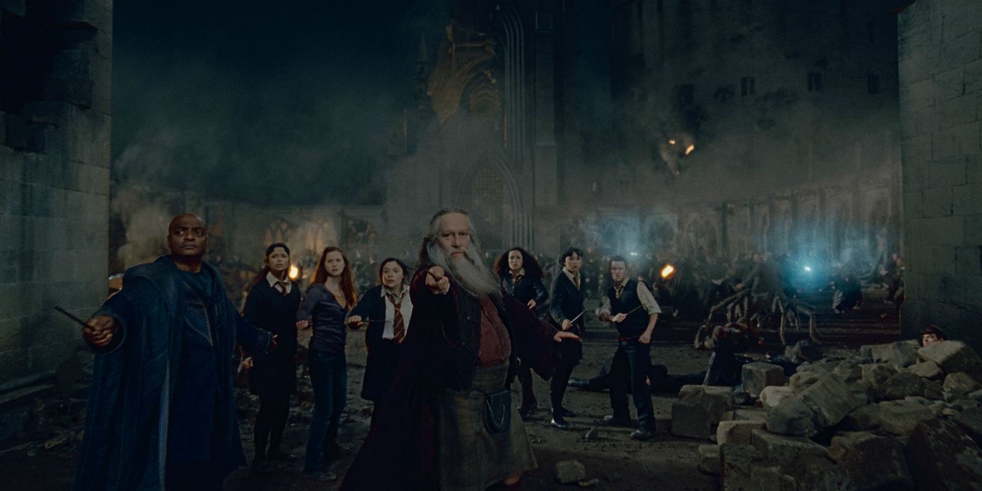 Kingsley Shacklebot, Ginny Weasley, Aberforth Dumbledore and students during the Battle for Hogwarts