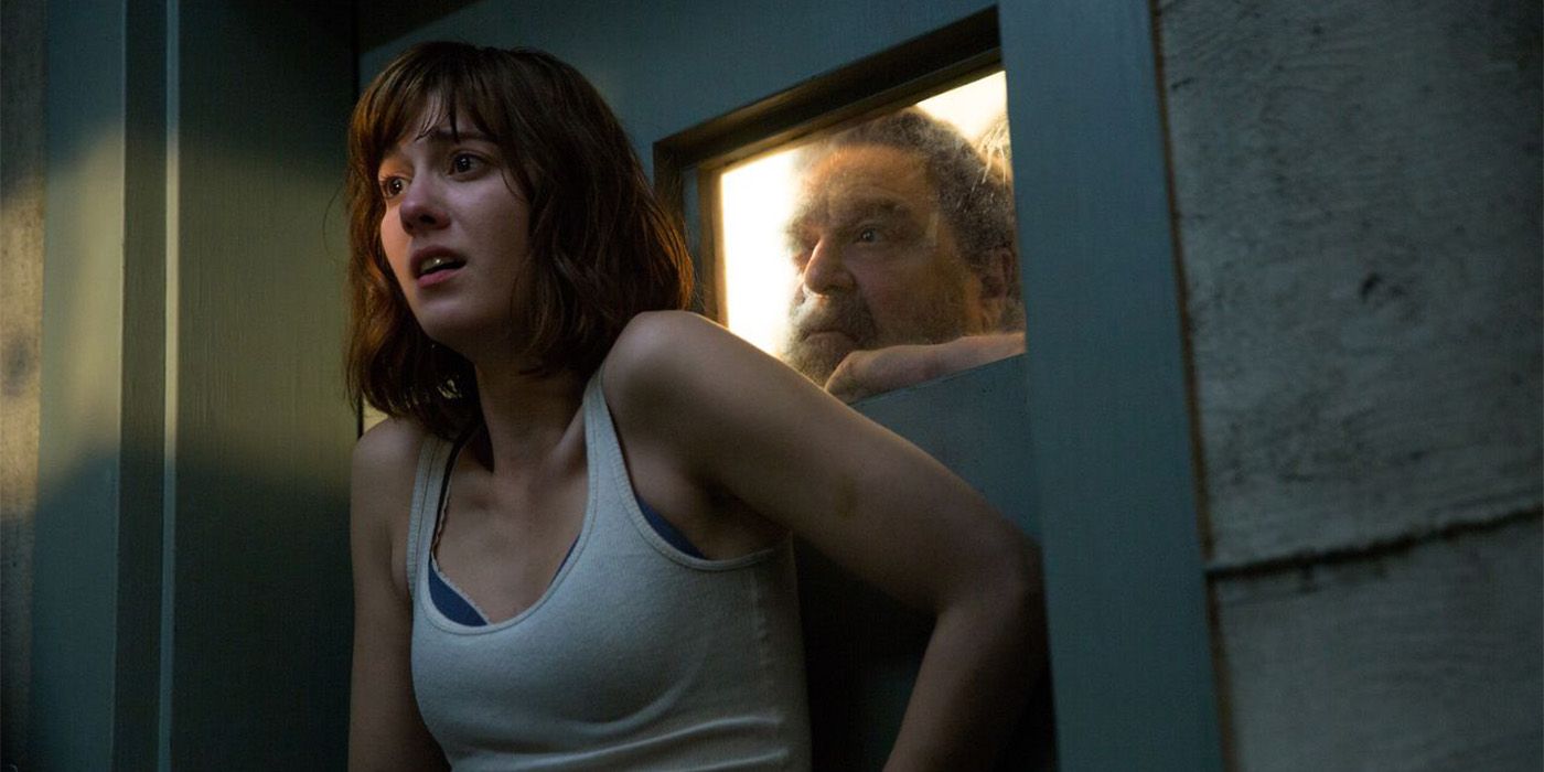 Michelle worryingly leans against a door in 10 Cloverfield Lane