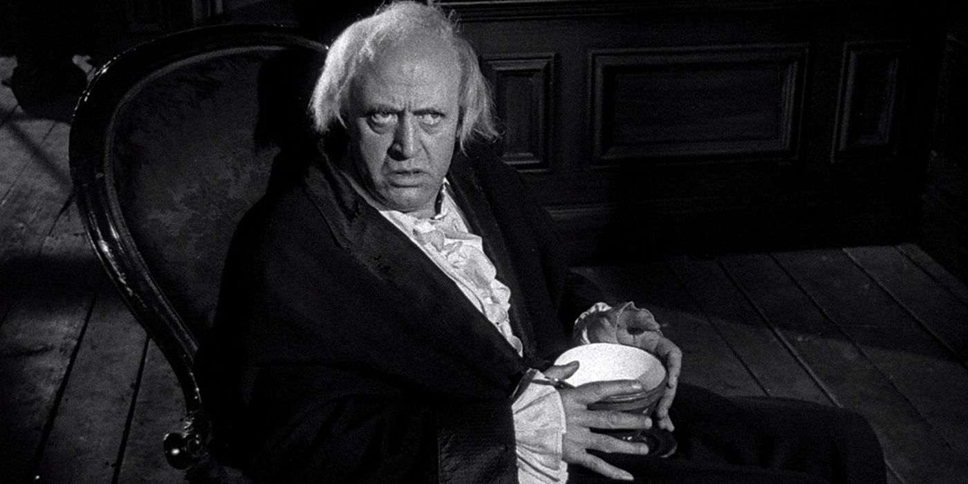 Alastair Sim como Ebenezer Scrooge em Conto de Natal