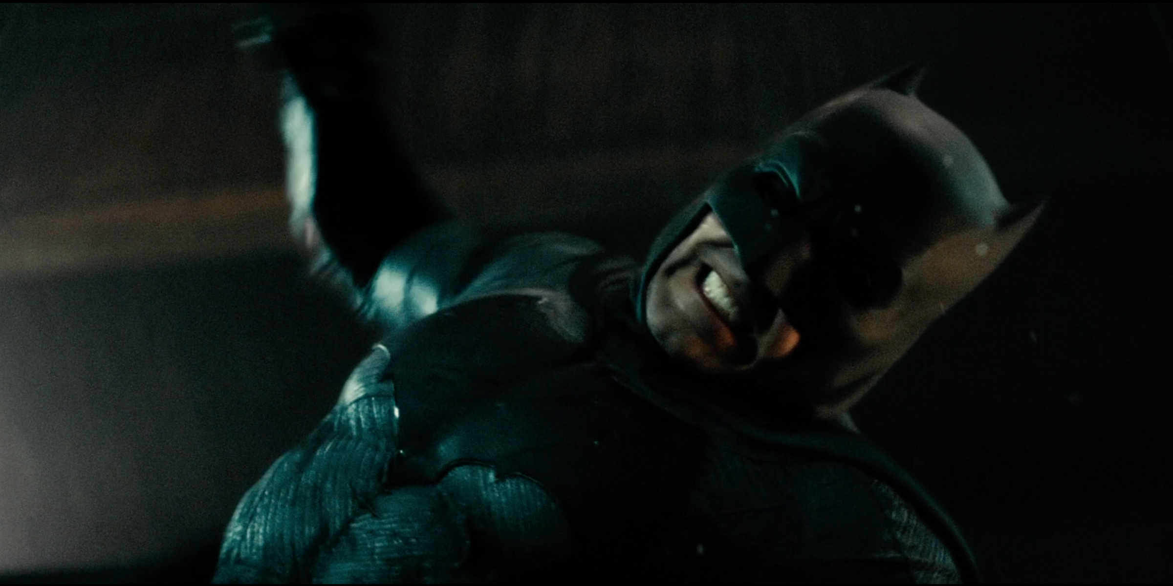 Batman hitting a guy in the warehouse fight in Batman v Superman