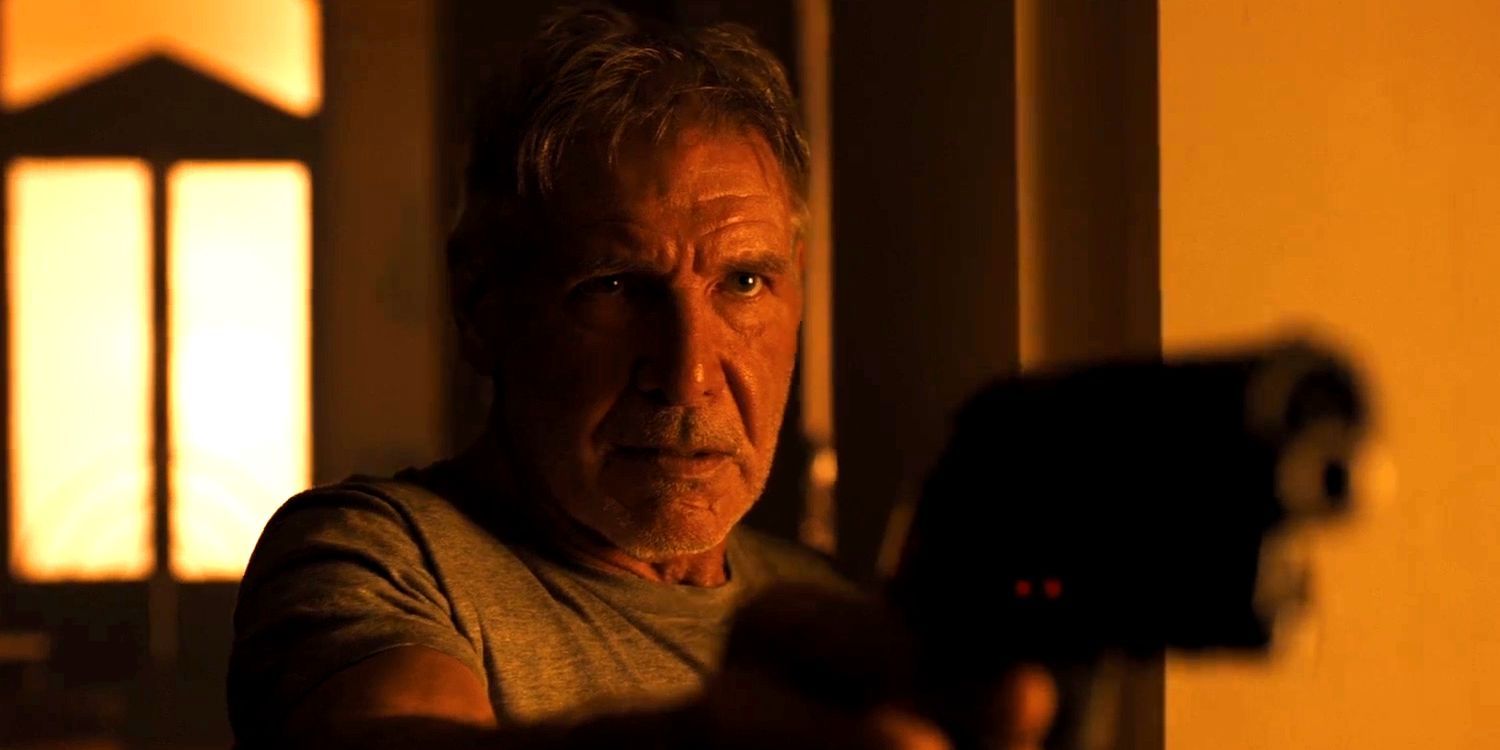 Harrison Ford as Deckard pointing a gun in Blade Runner 2049