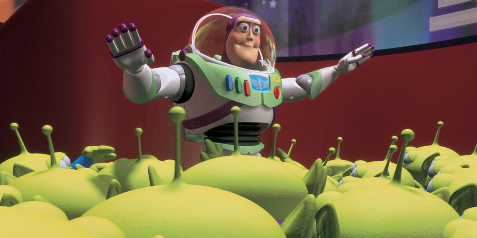 Buzz Lightyear standing over alien toys in Toy Story
