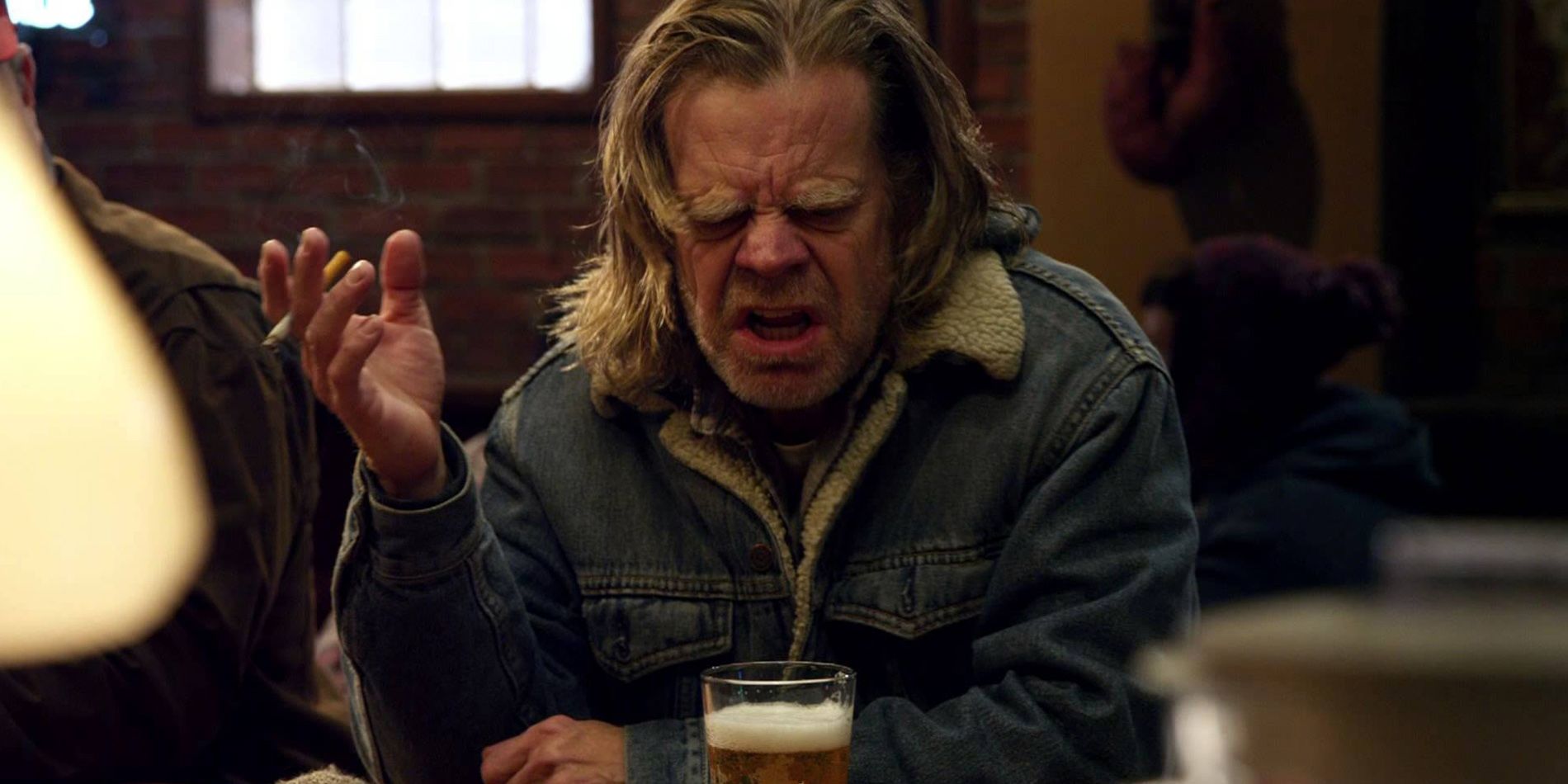 Frank Gallagher smoking and drinking at the bar in Shameless