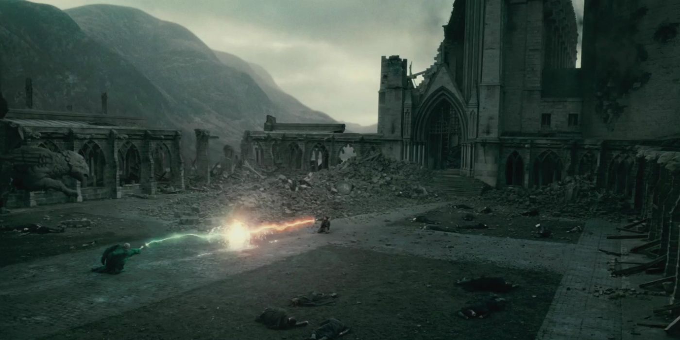 Voldemort and Harry battle among the ruins at Hogwarts