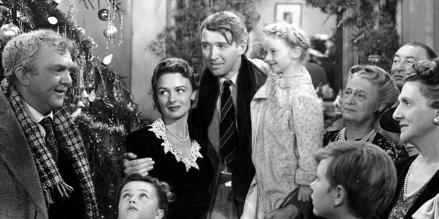 George Bailey com um grupo de pessoas em It's a Wonderful Life