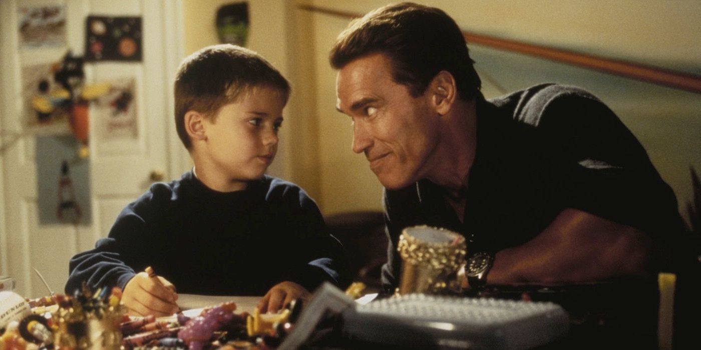 Jake Lloyd and Arnold Schwarzenegger share a father-son moment in a scene from Jingle All the Way