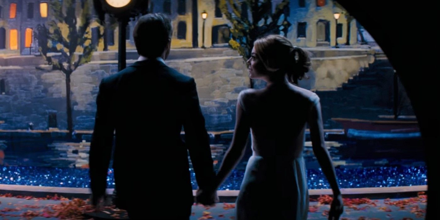 Mia and Seb walking hand-in-hand in the fantasy sequence of La La Land