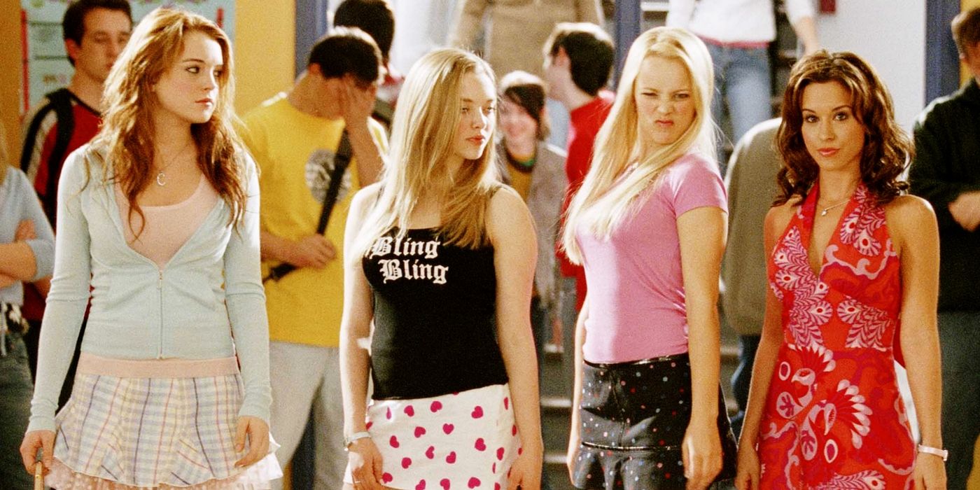 Cady, Karen, Regina, and Gretchen standing in high school hallway on Mean Girls