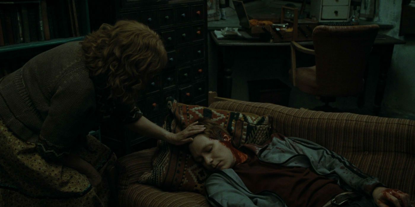 Molly Weasley Taking Care of George Weasley in Harry Potter and the Deathly Hallows Part 1