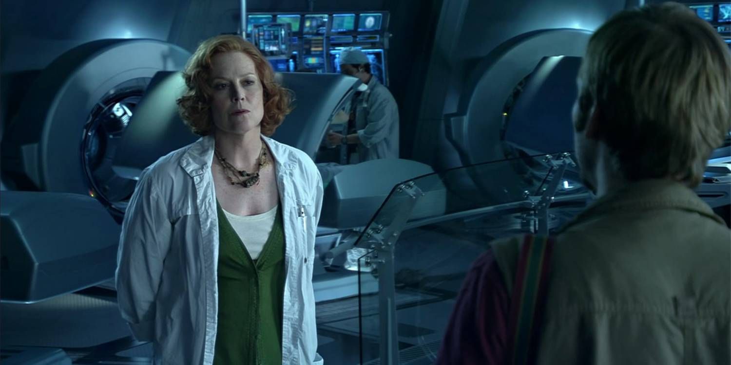 Sigourney Weaver as Grace Augustine standing in the lab in Avatar