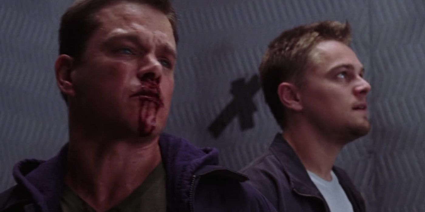 A bloodied Matt Damon as Colin Sullivan stands in an elevator with Leonardo DiCaprio as Billy Costigan in The Departed.