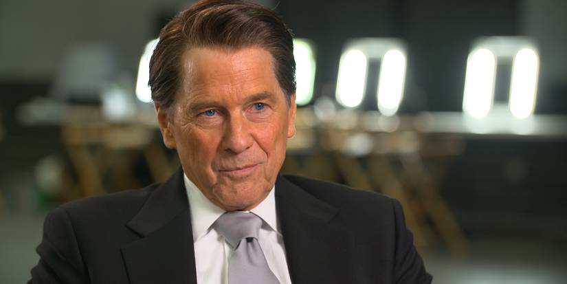 Tim Matheson in Killing Reagan smiling in suit