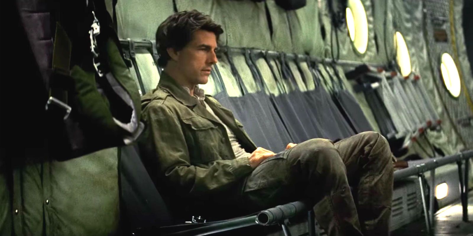 Tom Cruise sits on a plane in The Mummy