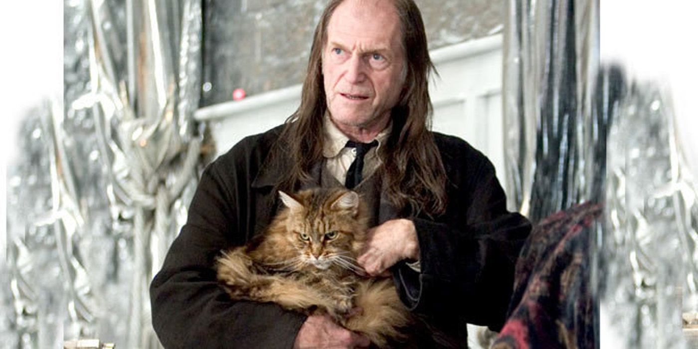 Argus Filch Holding Mrs Norris in Harry Potter