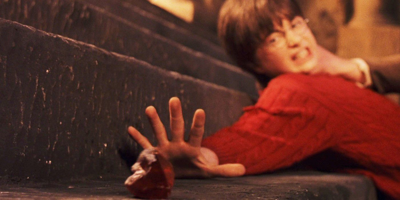 Harry Potter reaching for the Philosopher's Stone