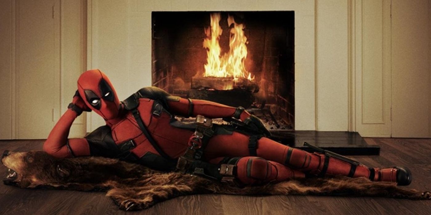 Deadpool laying on rug