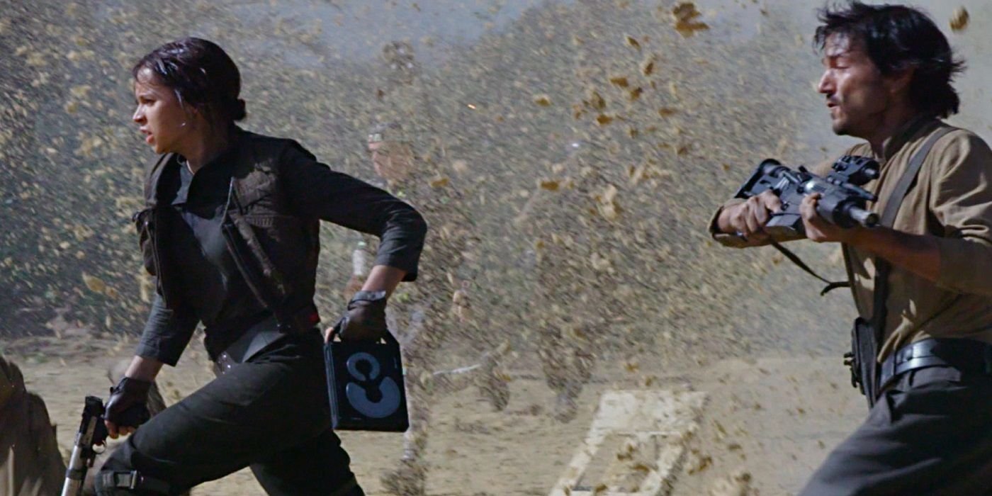 Diego Luna as Cassian Andor Felicity Jones as Jyn Erso in Rogue One A Star Wars Story Rebel Scarif