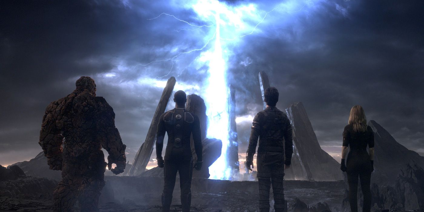 2015's Fantastic Four stare at a big blue light in the sky