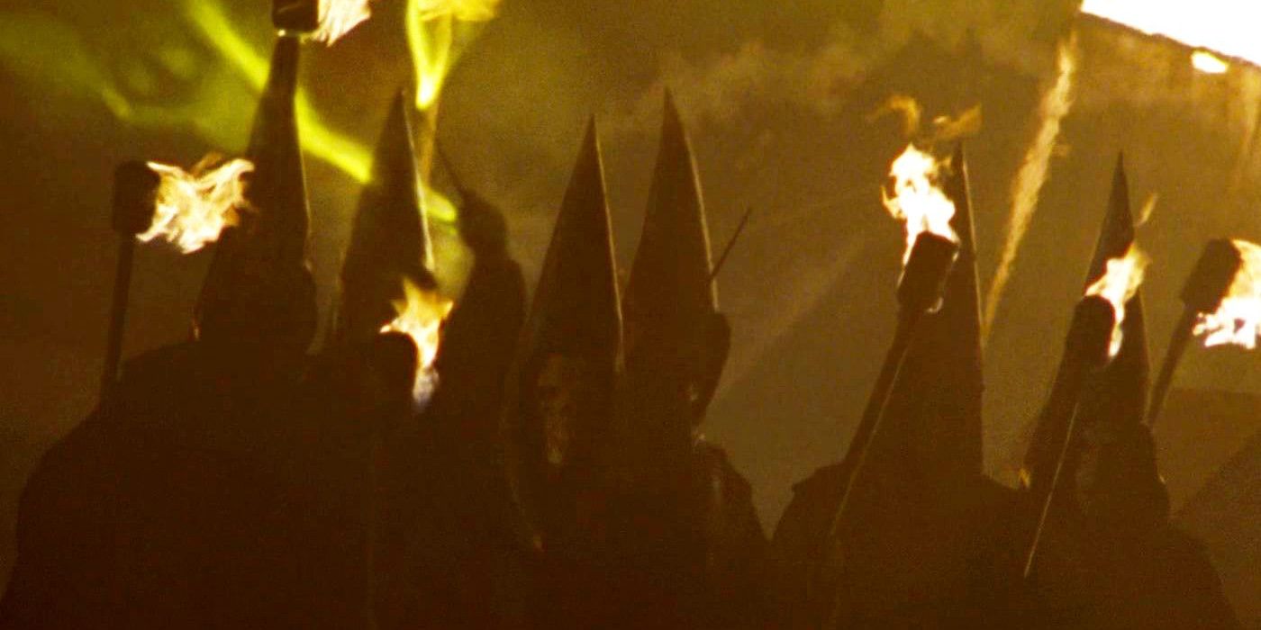 Death Eaters marching with pointed hoods in the Harry Potter movies