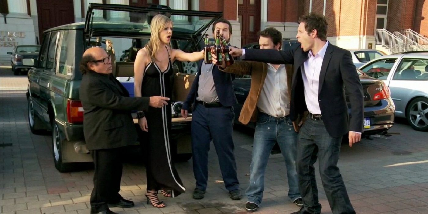 The gang clinking beers in the parking lot in It's Always Sunny.